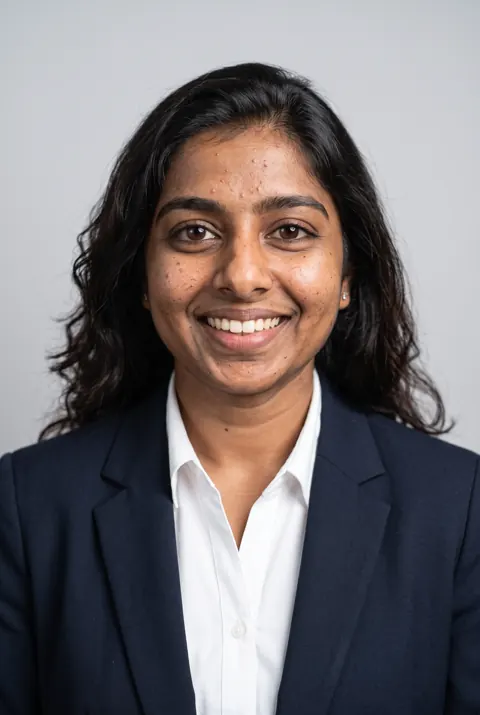 Example AI headshot, Classic Corporate style (AI-generated person)
